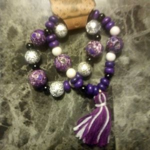 Twin pack of purple tassel bracelets